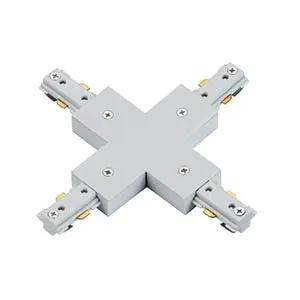 X-shaped track lighting connector for LED light fixtures and wiring applications