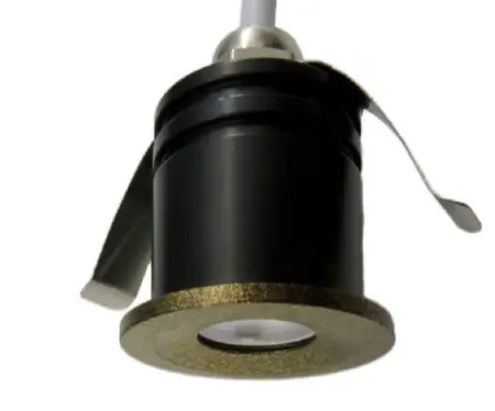Black recessed LED downlight with gold trim for modern interior lighting installations