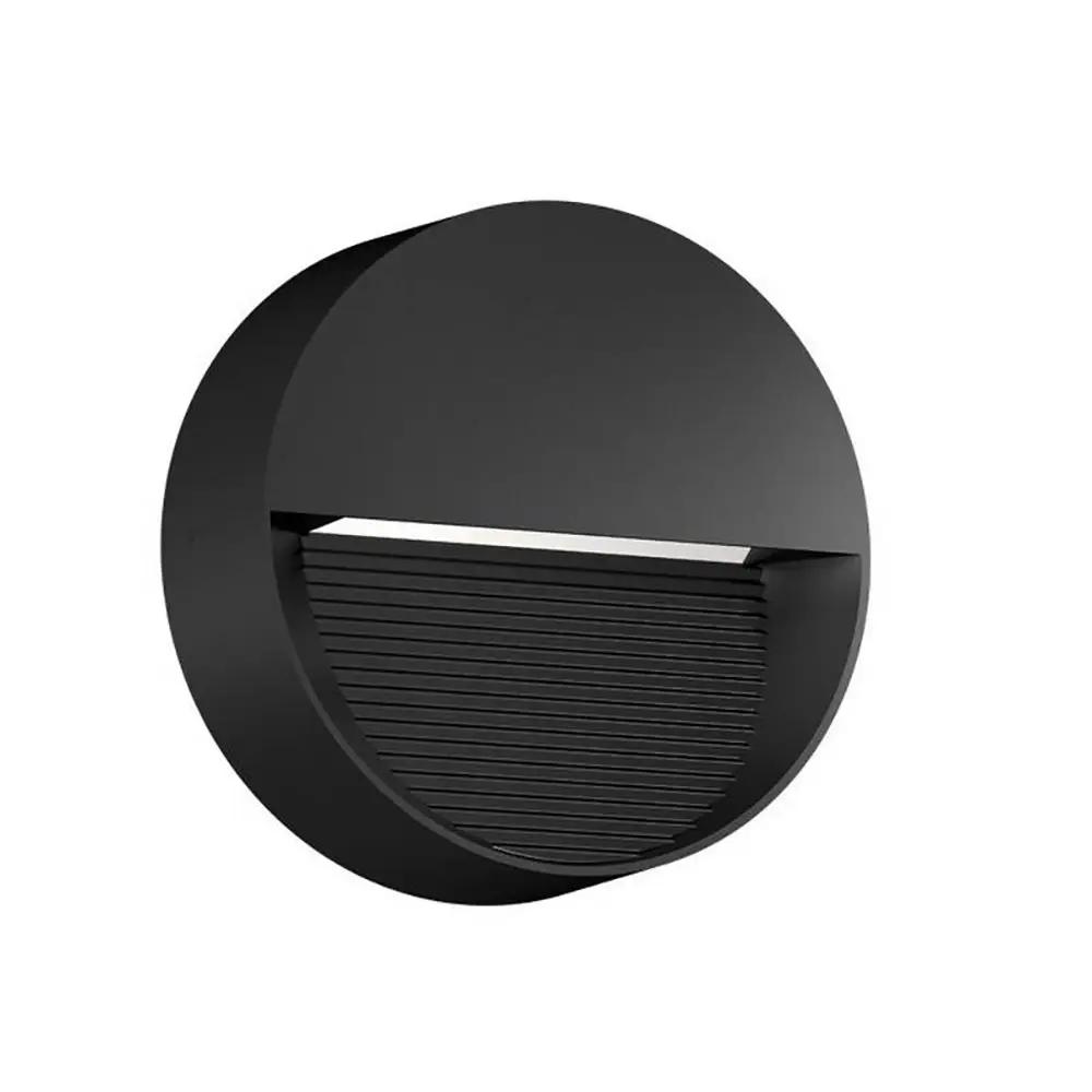 ZYKOS 8W IP65 Round Surface Mounted Wall light Black Asymmetric beam 2900K 400Lm