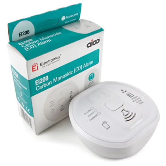 Battery powered carbon monoxide alarm with white casing and product packaging