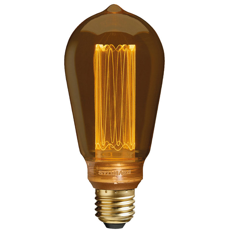 Vintage style LED filament bulb glowing with warm amber light