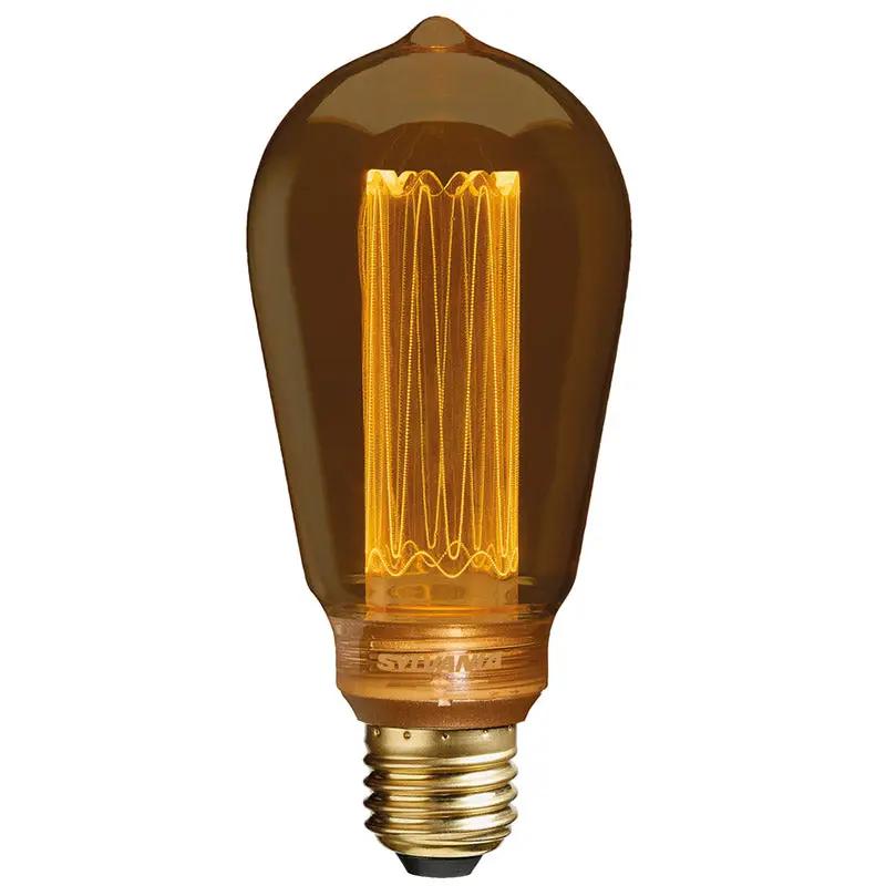 Vintage style LED filament bulb glowing with warm amber light