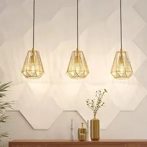 Stype hanging light, gold-coloured, length 96 cm, steel, 3-bulb.