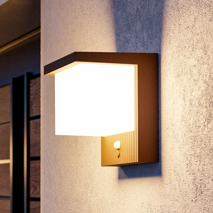 Frigento rust-coloured LED solar wall lamp, height 15 cm, sensor