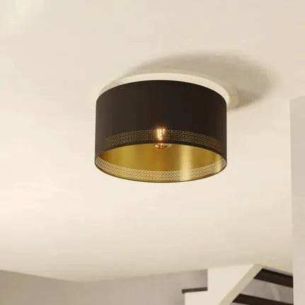 Esteperra ceiling light with black/gold punching