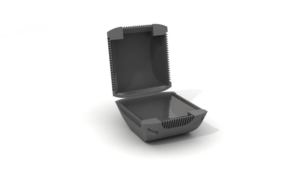 Open black plastic electrical enclosure box for wiring accessories on white background