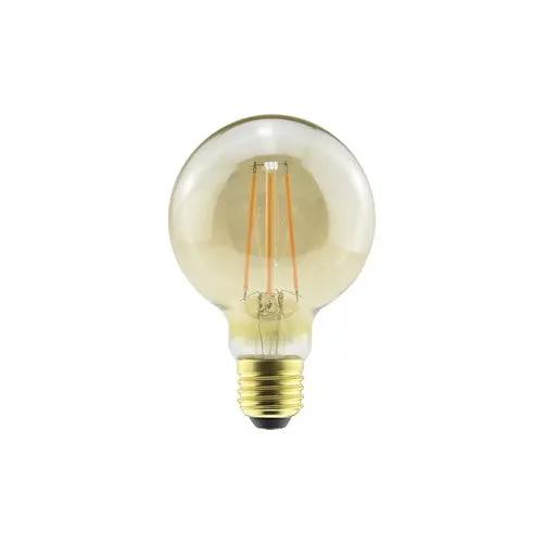 LED filament bulb with clear glass and brass screw base on white background